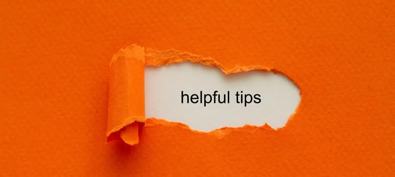 a graphic of an orange piece of paper, there's a tear in it which reveals the words "helpful tips" on the blog 5 tips for job hunters