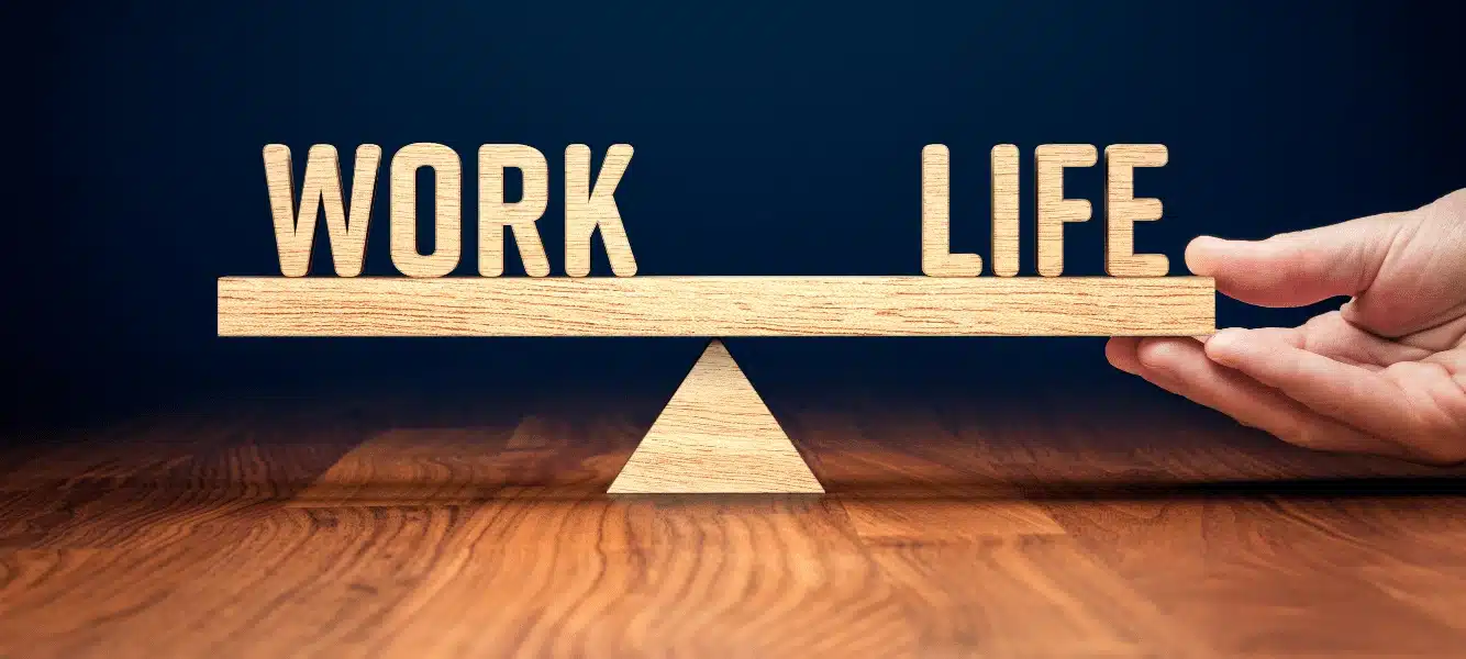 an image of the words work-life balanced on a piece of wood