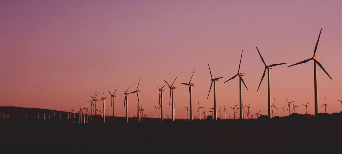 a photograph of multiple wind turbines on the clean energy talent blog