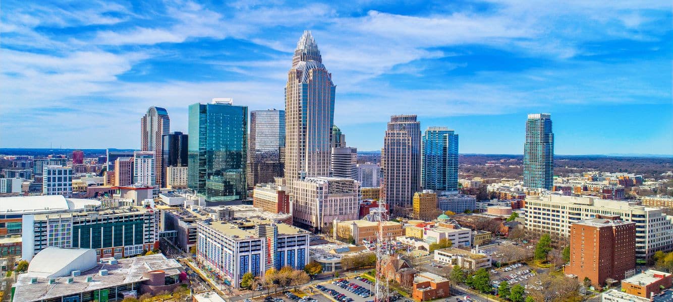 an image of the skyline of charlotte, north carolina the new headquarters of astute people inc