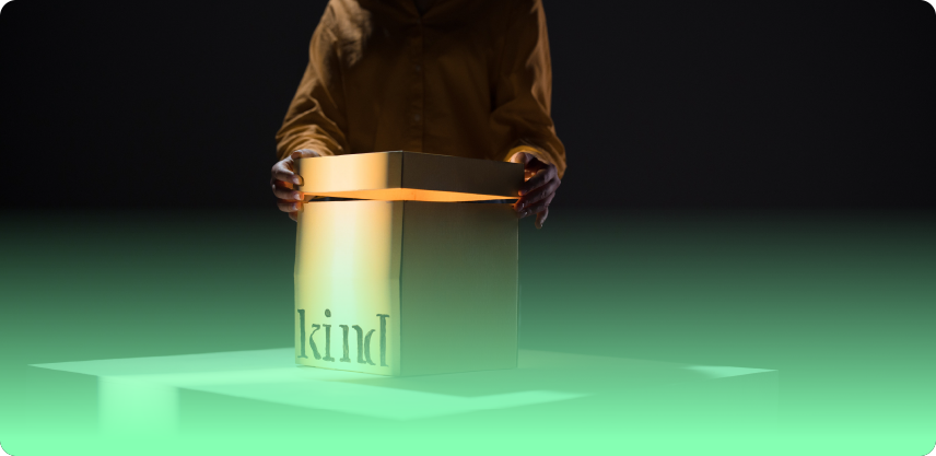 an image of a person opening a box with the word kind on it