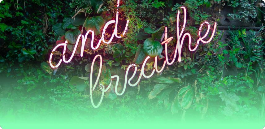 an image of a neon sign that reads 'and breathe'