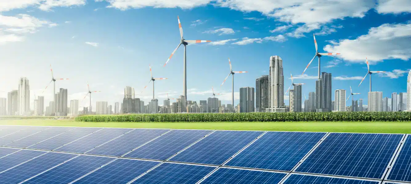 Guide to renewable energy jobs - a cityscape with wind turbines and solar panels