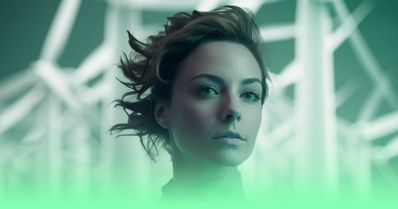 An image of a woman standing in front of wind turbines, with a green overlay gradient starting from the bottom